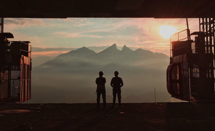 Two Construction Worker Watching The Sunrise - Personal Injury Attorney -Boxer & Gerson, LLP